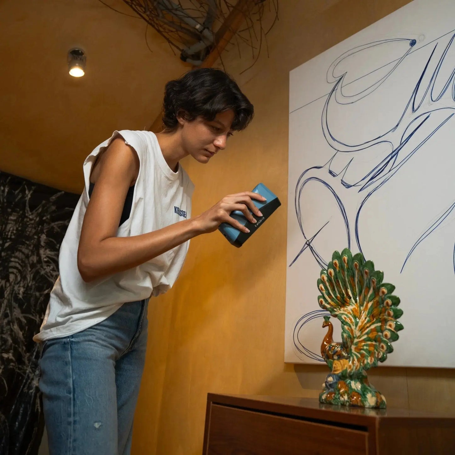 SHINING 3D Einstar 2 Handheld Scanner capturing a small artifact for cultural heritage preservation