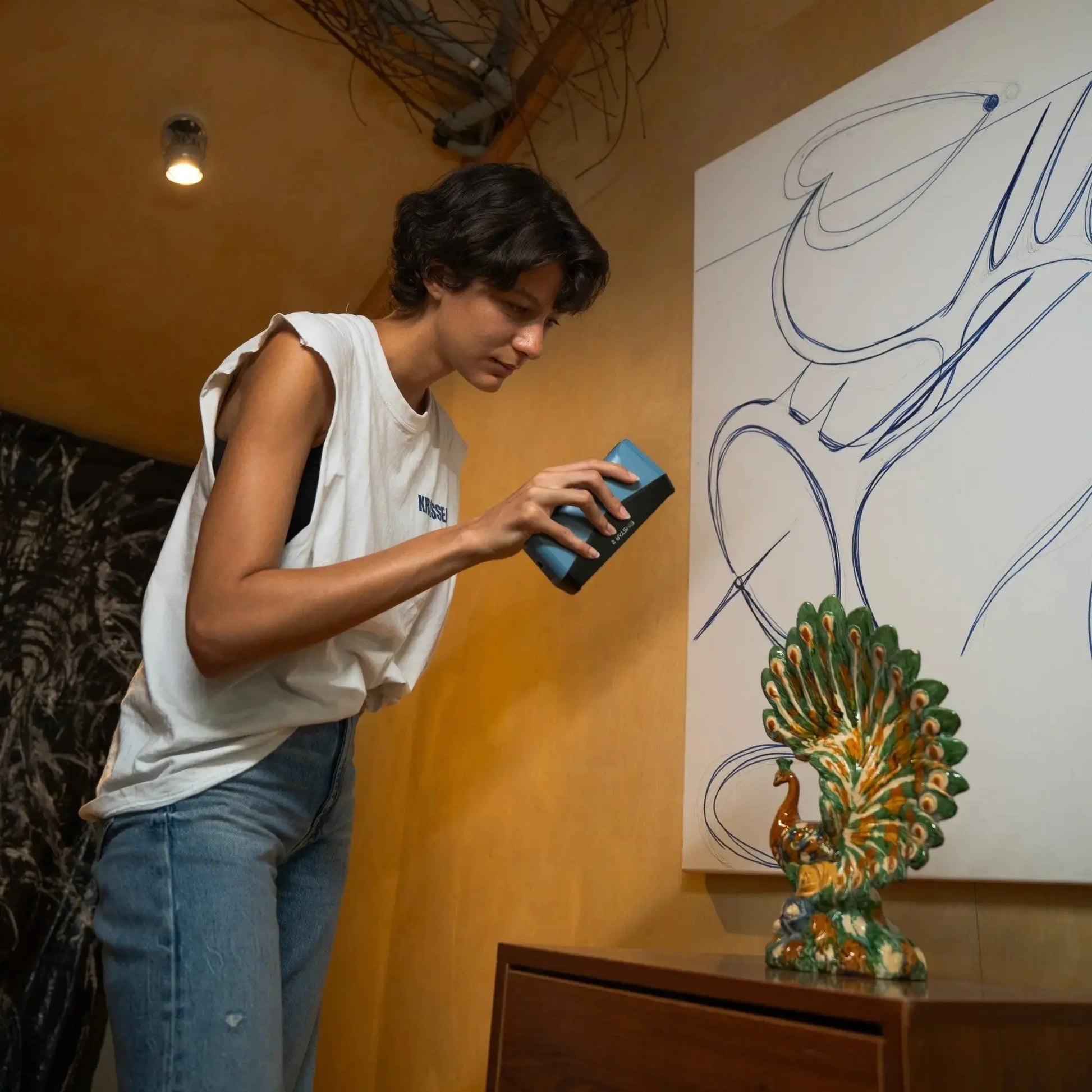 SHINING 3D Einstar 2 Handheld Scanner capturing a small artifact for cultural heritage preservation